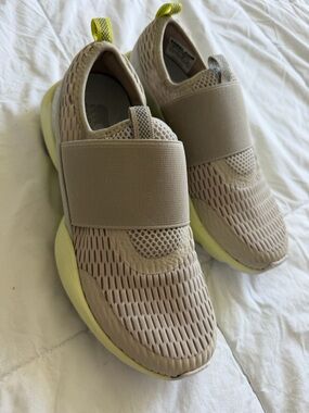 Sorel Slip-On Knit Sneakers in Beige with Pale Yellow Accent